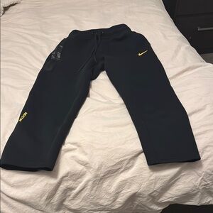 Nike Kids Black Joggers with Yellow Accents